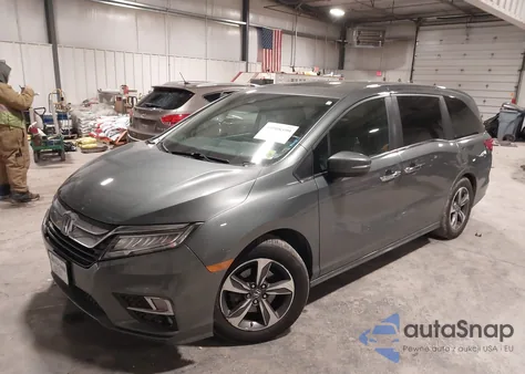2018 Honda Odyssey Touring z USA, uszkodzony, nr VIN 5FNRL6H86JB007596